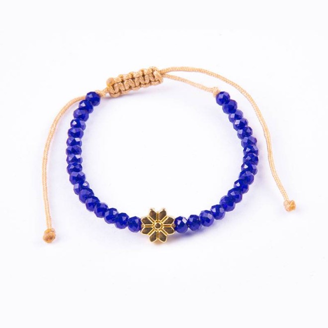 Βραχιόλι με κρυστάλλινες χάντρες μπλε 4mm και μεταλλικό μοτίφ χρυσό λουλούδι, κλείνει με αυξομείωση